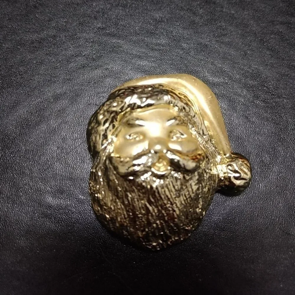 Gold tone vintage Santa Claus brooch